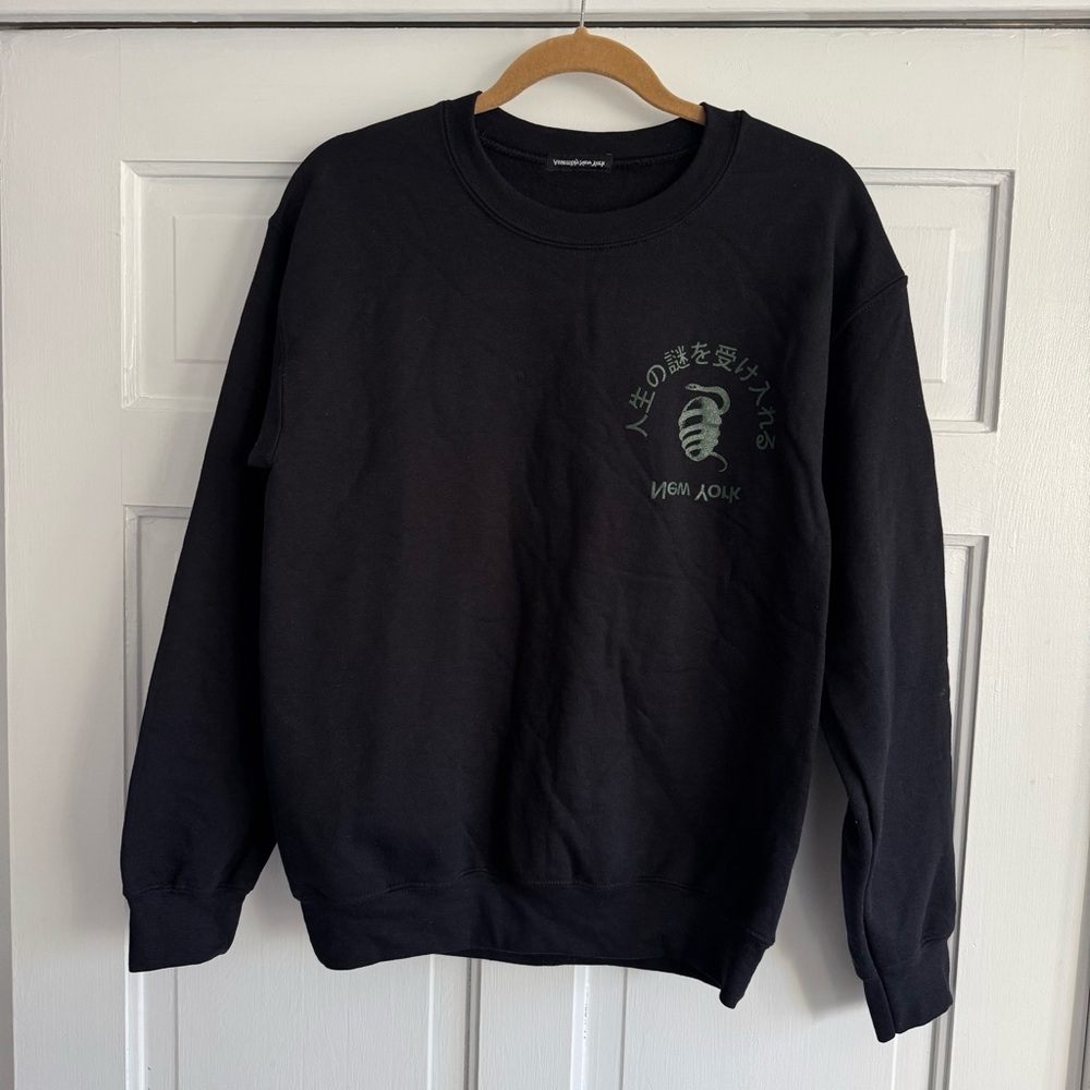 Assembly New York Black Crewneck Sweatshirt Embrace Mystery with Green Graphic